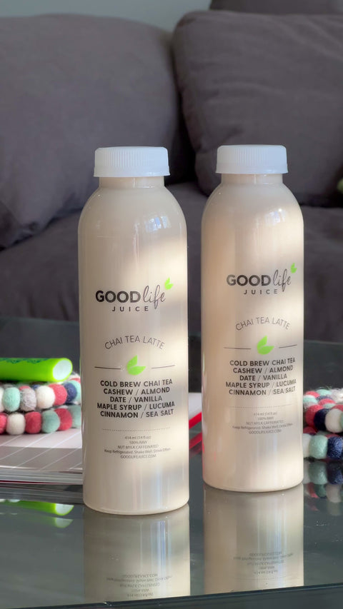 Video showing two Chai Tea Latte bottles on a reflective surface.